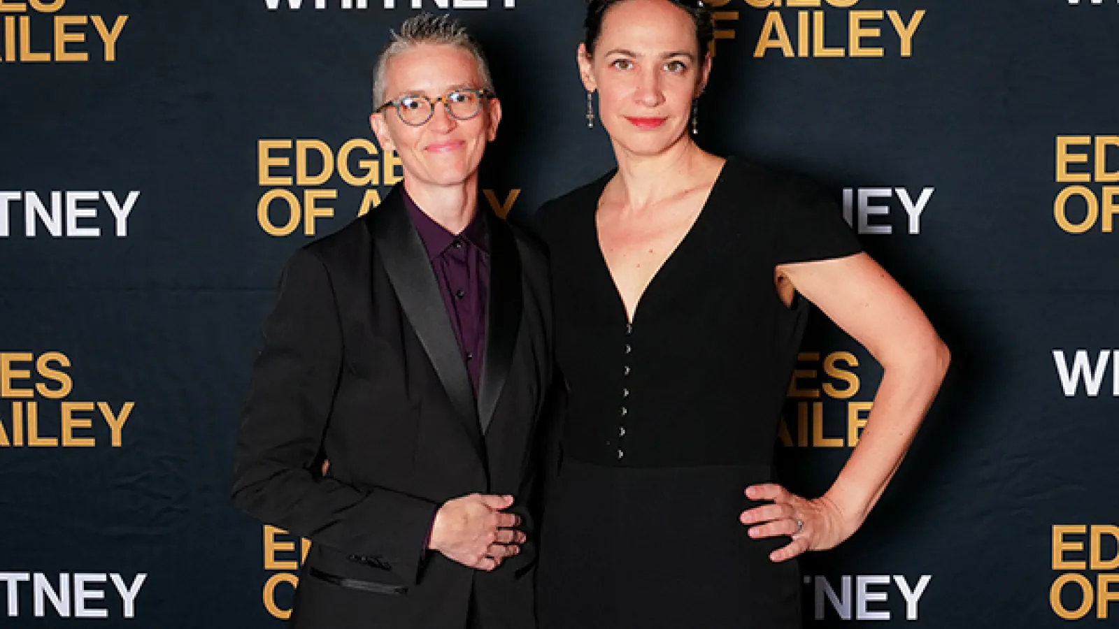 Two people standing together