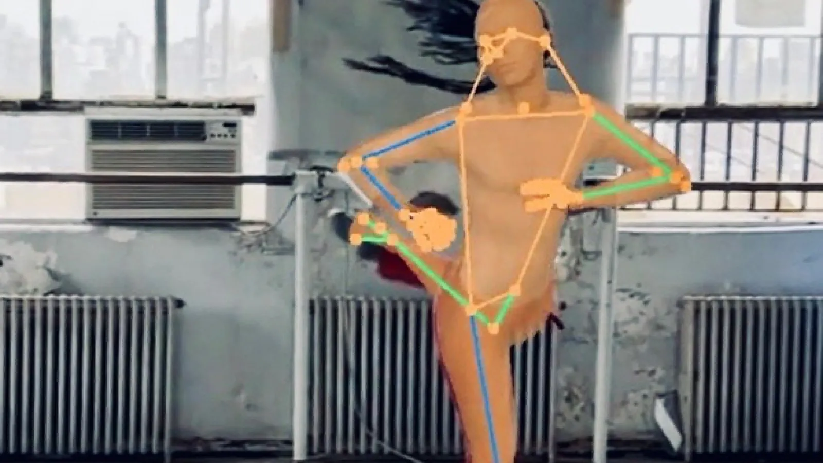 an image of an avatar of a dancer with dots and lines indicating movement points in a studio