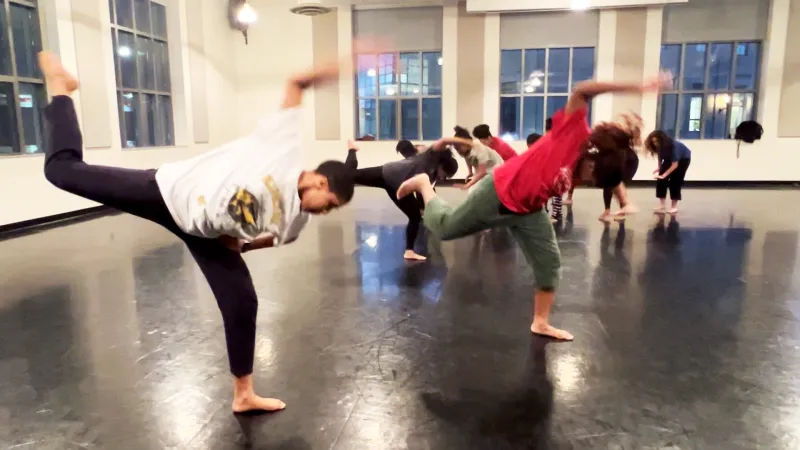 Dancers rehearsing in a studio
