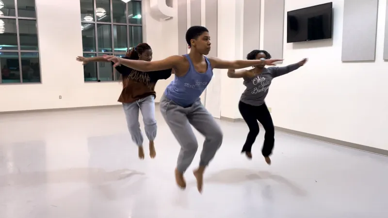Dancers rehearsing in a studio