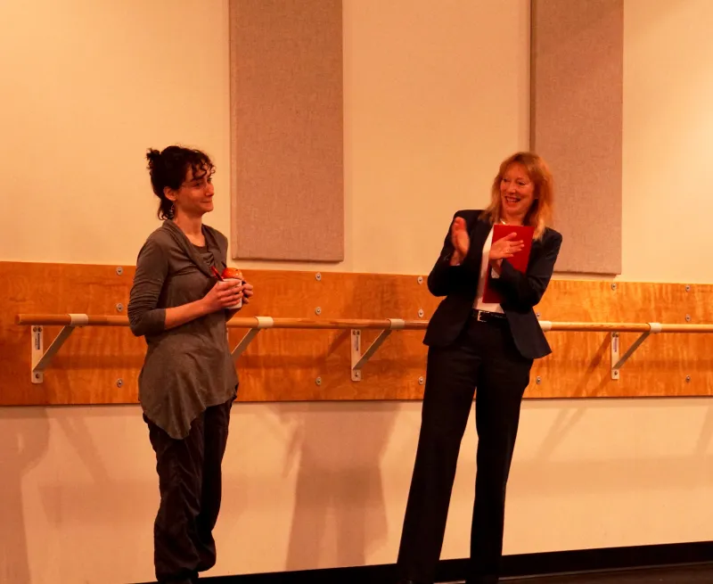 Katherine Moore is presented with the award by Dean Alicia L. Bertone. 